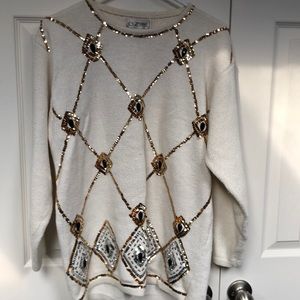 Beautiful sweater. Gold, black and silver sequins